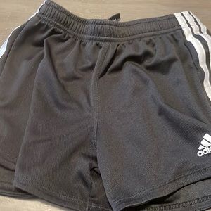 Black adidas sport shorts.